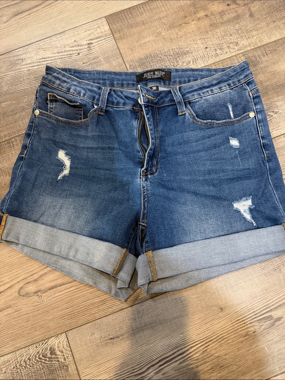Judy Blue Rolled Hem Distressed Denim Shorts in Blue